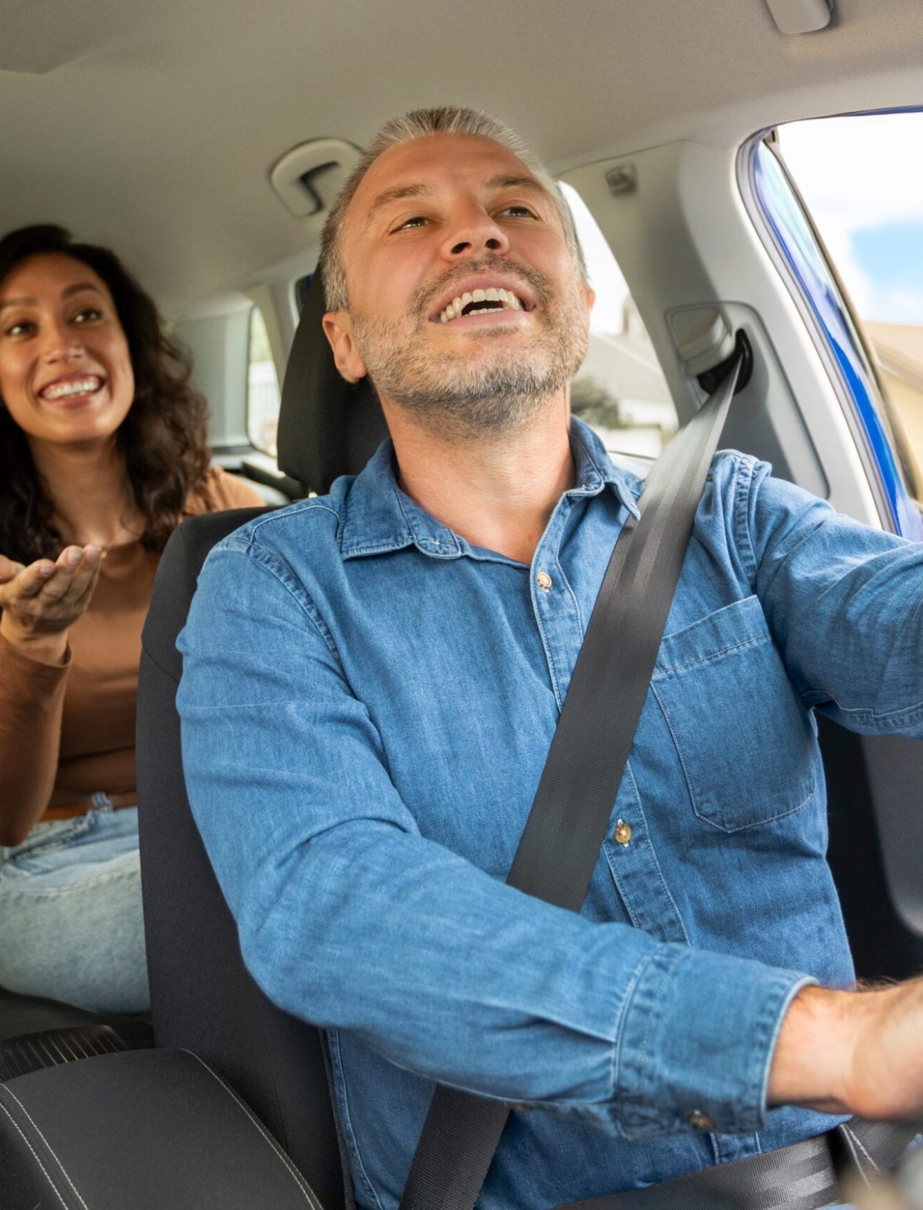 Positive,Woman,Passenger,Talking,To,Cheerful,Taxi,Driver,Man,,Lady